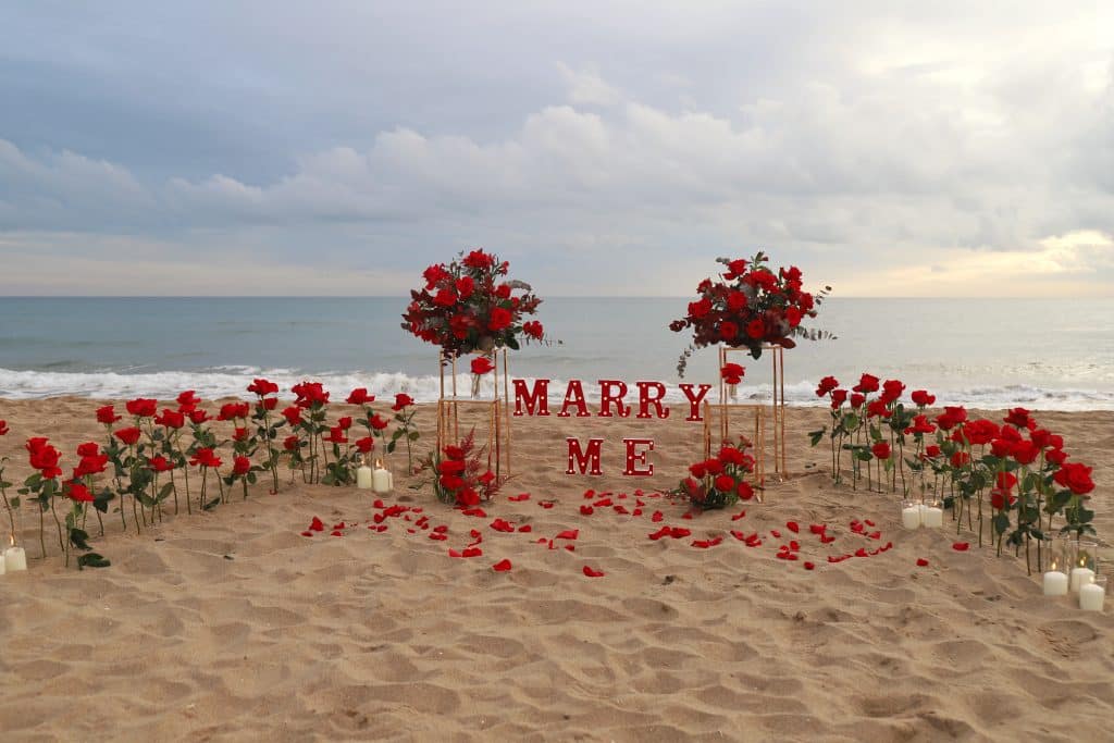 Romantic proposal on a Barcelona rooftop at sunset